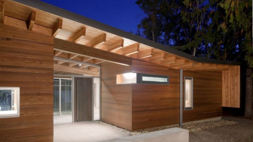 Front Door of a Mixture of Classic Style and Modern Wood Shuswap Cabin by Splyce Design