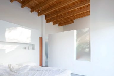 Minimalist Bedroom of Shuswap Cabin by Splyce Design