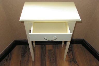 Small White Table With a Rack