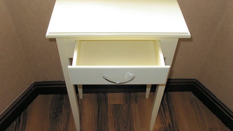 Small White Table With a Rack