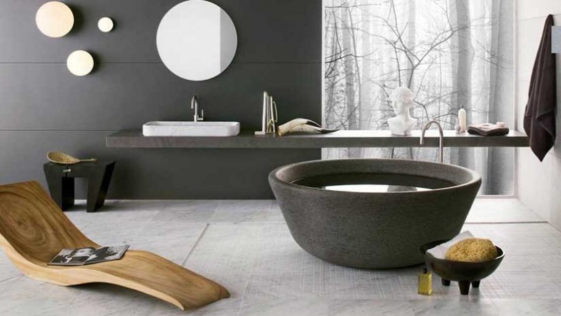 Artistic Bathrooms from Neutra with Stone Tub and Lounge Wooden Chair