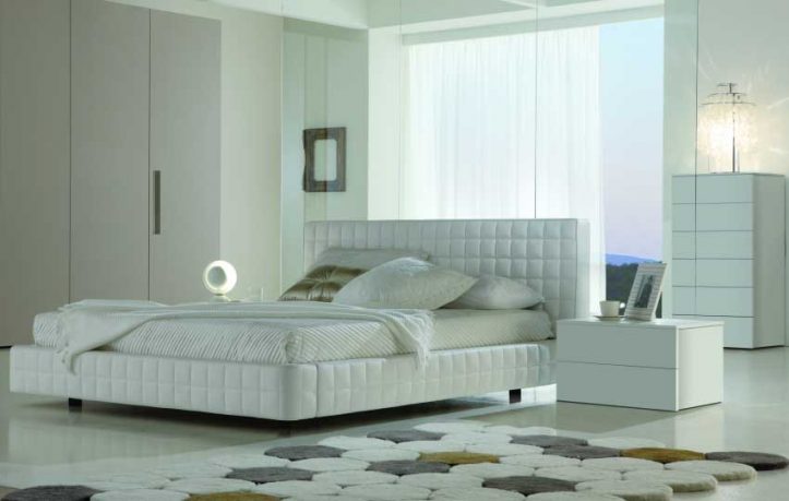 Beautiful White Bedroom with Circle Rug