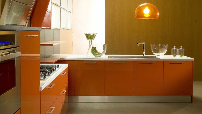 Di Lorio Cucine Orange Kitchen with Chandelier