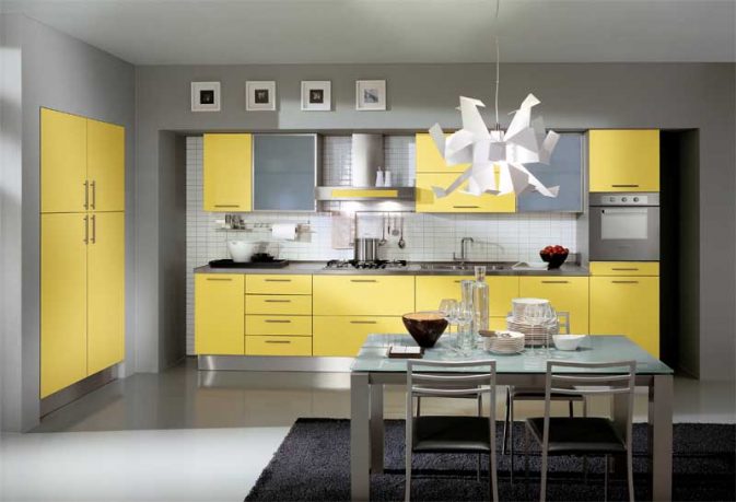 Modern Yellow Kitchen Design with Unique Chandelier and Black Rug