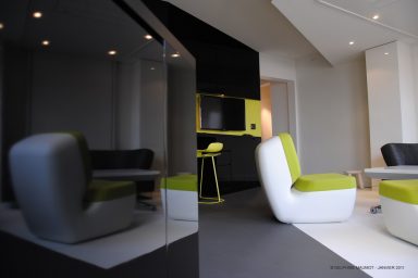 Black and White Loft Studio Area with Gree Accents