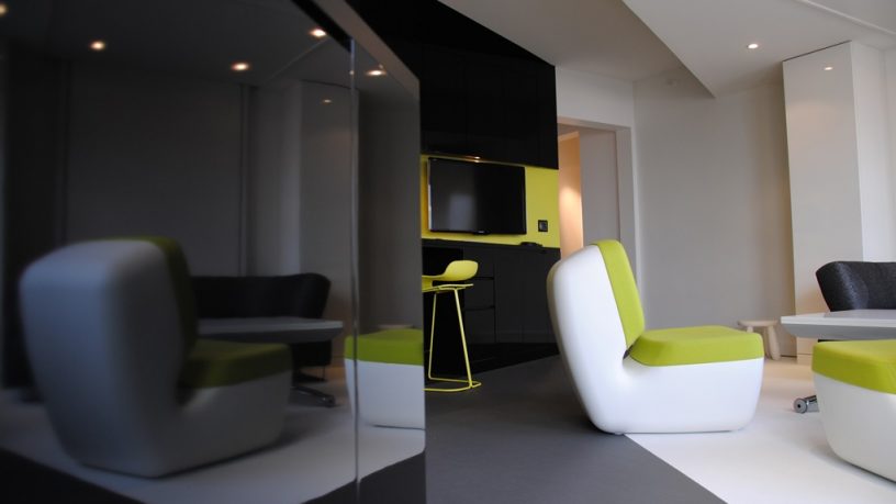 Black and White Loft Studio Area with Gree Accents