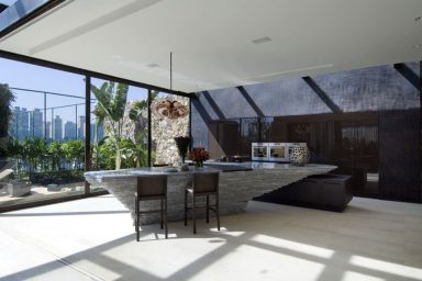Modern Mini Bar and Kitchen Area with Glass Wall