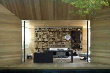 Modern Open Library Space with Wood Wall Decor