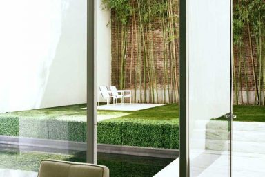 Outdoor Urban Garden in Back of Modern Townhouse
