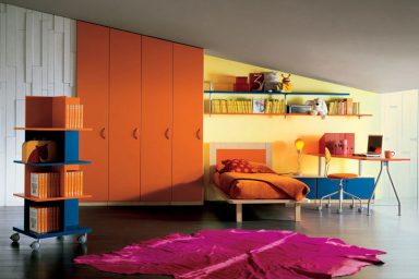 Sloping Ceiling Kids Room with Orange Wadrobe