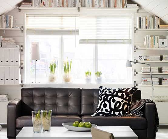 White Living Room with Black Lether Couch