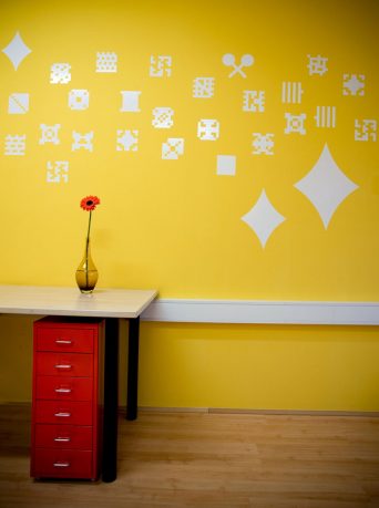 Yellow Wall with Dot Pixel Decorations