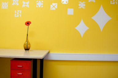Yellow Wall with Dot Pixel Decorations