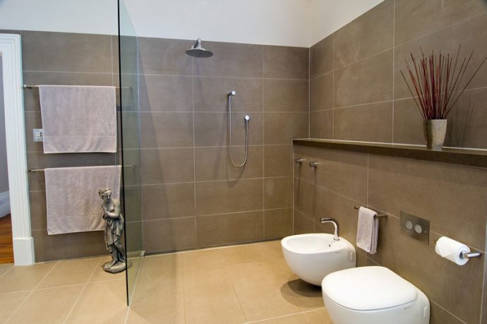 Modern Brown Bathroom with Glass Wall Separate
