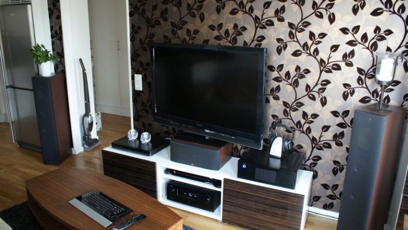 Modern LCD TV Room Design with Leaf Wallpaper