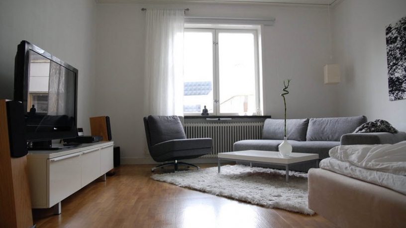 Natural Lighting Living Room with LCD TV and Sofa Set