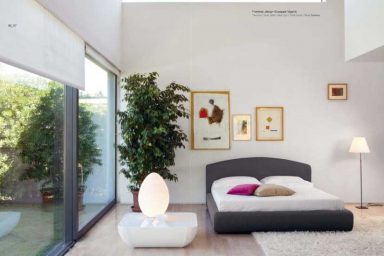 Beautiful Gray White Bedroom with Glass Wall and Pink Pillow