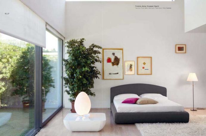 Beautiful Gray White Bedroom with Glass Wall and Pink Pillow