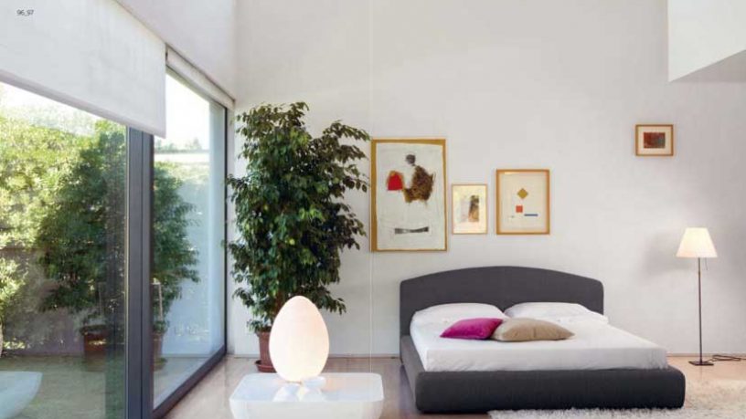 Beautiful Gray White Bedroom with Glass Wall and Pink Pillow