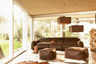 Brown Couch Country Living Room with Cowhide Rug Decor