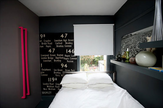 Dark and Moody Bedroom Apartment with White Bed