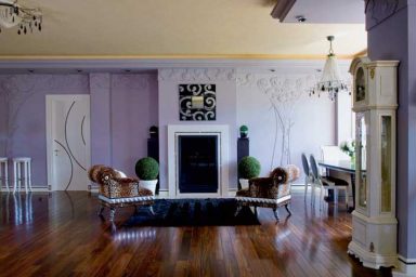 Luxury Living Room with Rugs and Wooden Stairs