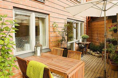 Awesome Balcony with Umbrella and Wooden Floor
