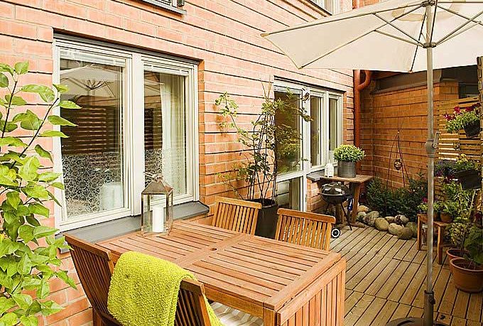 Awesome Balcony with Umbrella and Wooden Floor