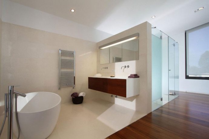 Clean Luxury Bathroom with Wood Floor