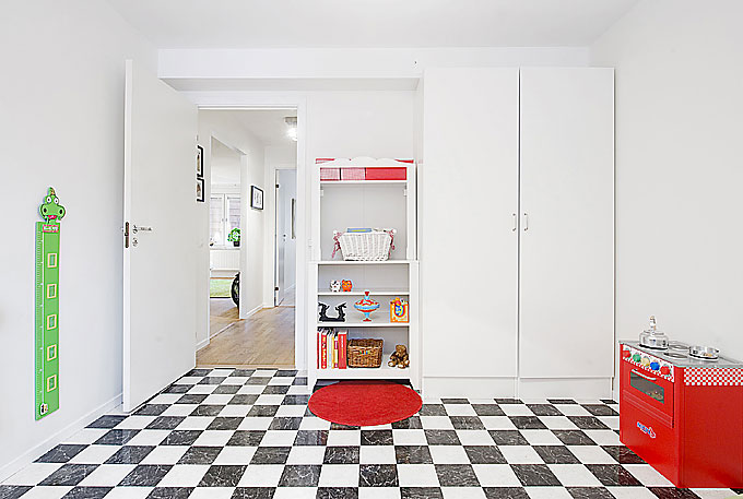 Kids Room with Wall Height Gauges and Red Accents