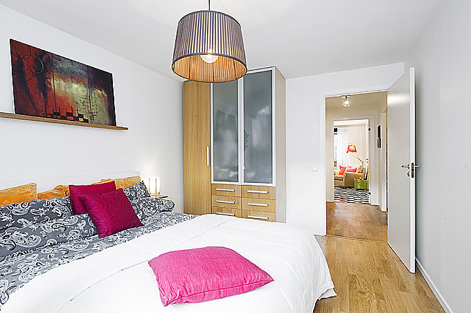 Small Bedroom Space with Chandelier