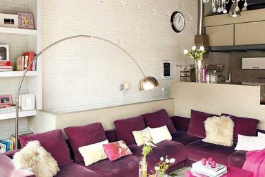 Catchy Living Room with Chandelier and White Brickwall