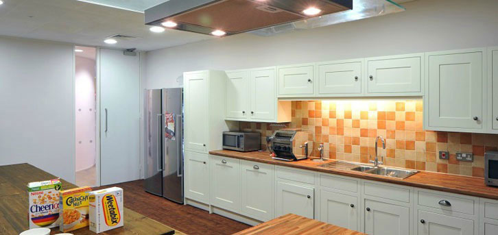 Moder Kitchen Design with Orange Tile Wall