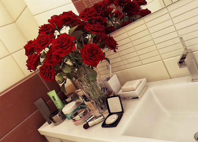 Red Roses on the Bathroom Vanity