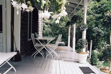 Calm White Porch with Wooden Floor Design