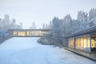 Glass Sliding Wall Sided House in Snow