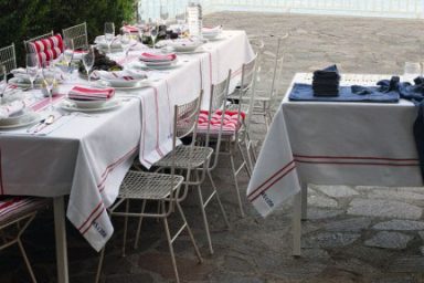 Outdoor Dinning Areas with White and Red Table Cloth