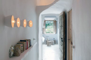 Unique Cave Home Hallway with Old Door Design