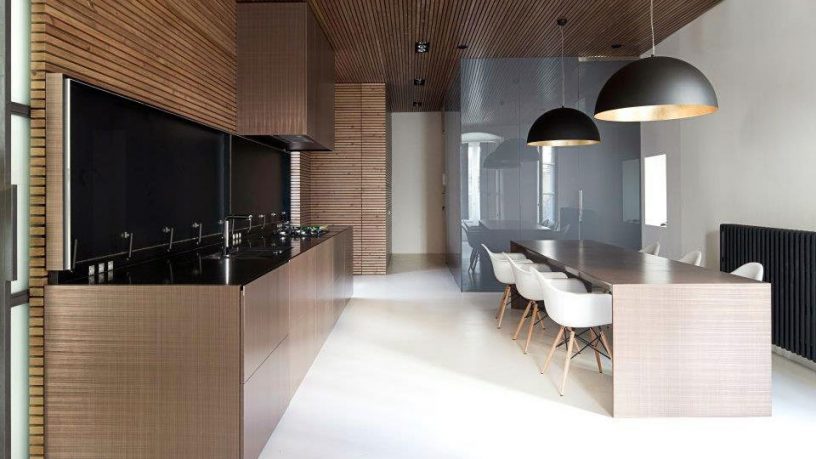 Kitchen Paneled with Tinted Pine Wood Slats