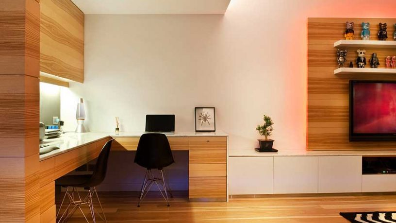 Minimalist Home Office with Wood Floors