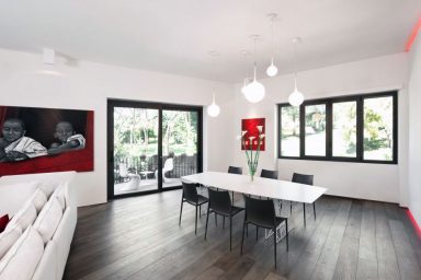 Beautiful Red White Open Plan Living Area with Wooden Floor