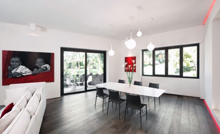 Beautiful Red White Open Plan Living Area with Wooden Floor