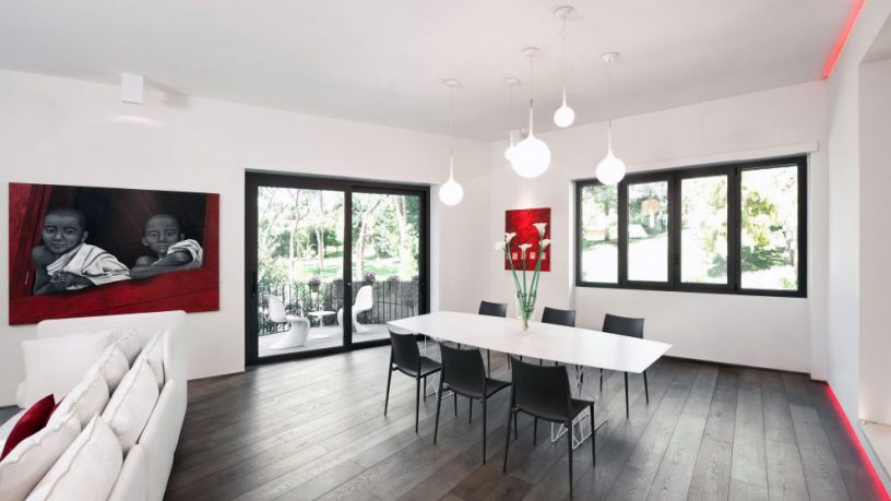 Beautiful Red White Open Plan Living Area with Wooden Floor