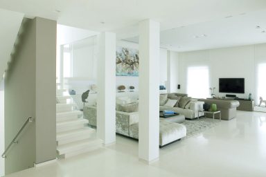Clean White Living Room Wit LCD TV