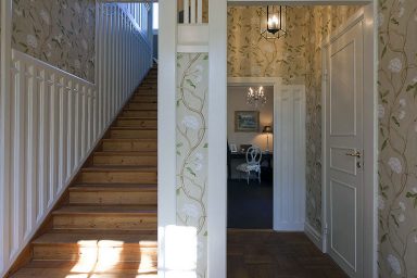 Cool Design Wooden Staircase with Flower Wall Print