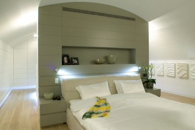 Minimalist Bedroom Residence with Lamp in Backrest