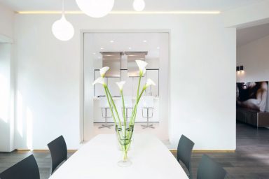 Minimalist Dining Table Set Up with Flowers Decor