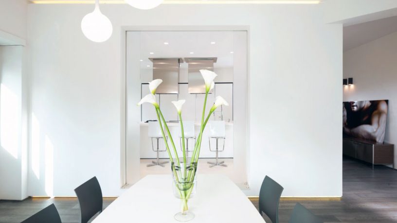 Minimalist Dining Table Set Up with Flowers Decor