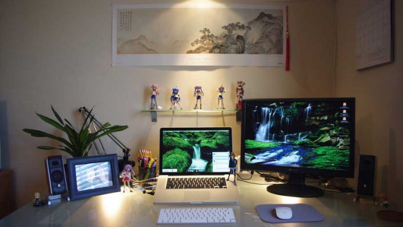 Minimalist Glass Workspace with Action Figure