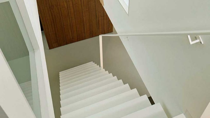 Minimalist White Stairs Apartment